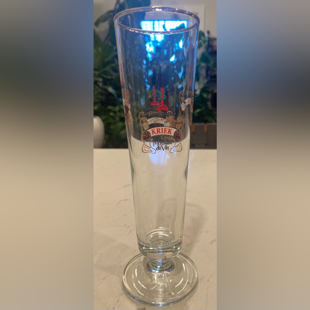 Lindemans Beer glass, 1 tall clear 4 fruit emblems gold rim engraved.